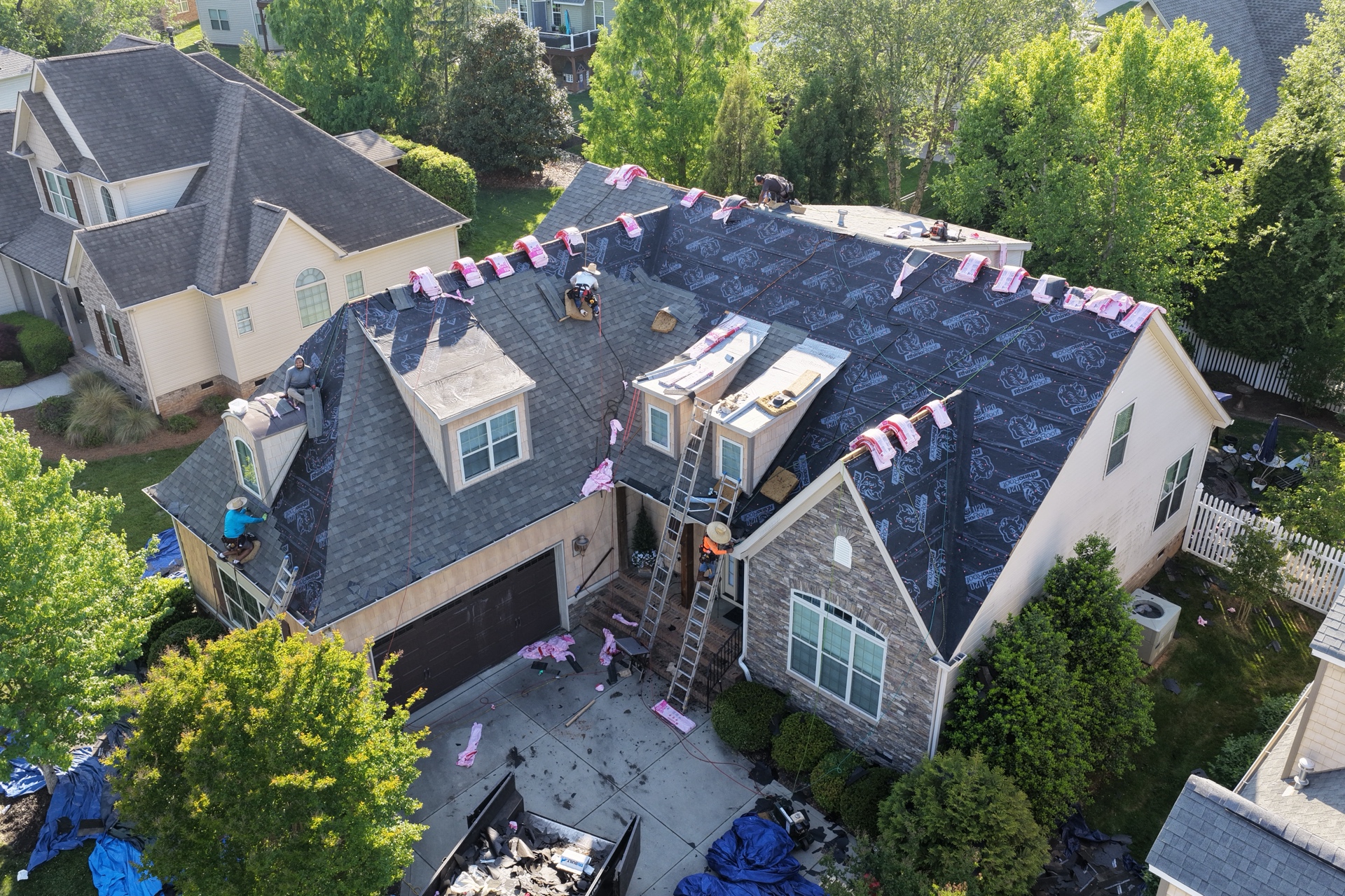 Exterior Genie crew installing a full residential reroof in Lexington, SC